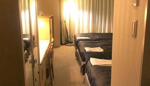 Habitación triple, fumadores