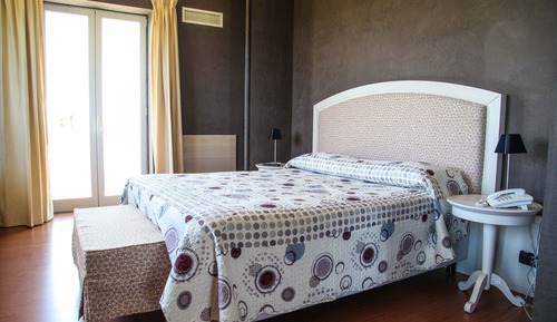 Habitación estándar con 1 cama doble o 2 individuales