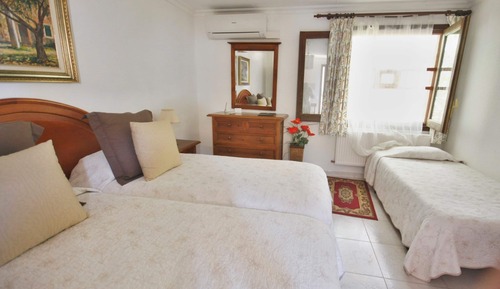 Habitación triple, lanai, vistas al jardín