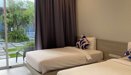 Habitación Deluxe con 2 camas individuales, 2 camas individuales, vistas al jardín