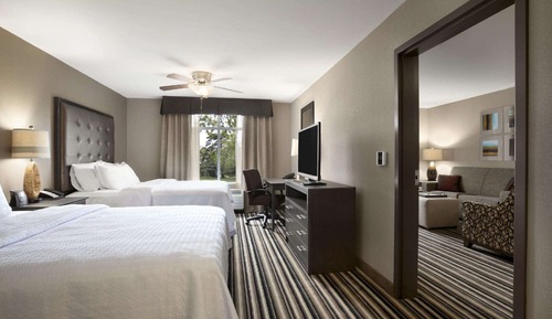 Suite, 2 camas de matrimonio, en esquina