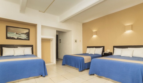 Habitación triple estándar, varias camas