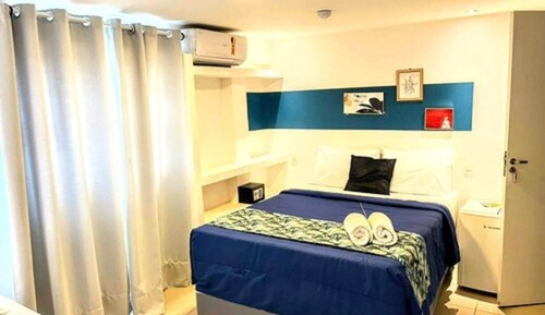 Quarto Quádruplo Premium