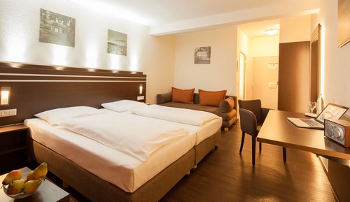 Habitación Confort con 1 cama doble o 2 individuales, varias camas