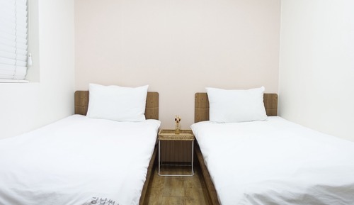 Habitación con 2 camas individuales