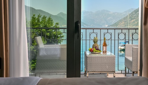 Habitación doble superior, 1 cama de matrimonio grande con sofá cama, vistas al mar