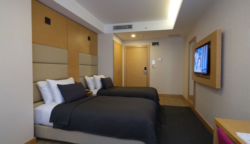 Habitación superior con 1 cama doble o 2 individuales