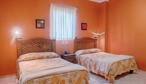 Habitación triple Confort, varias camas