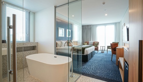 Habitación junior, 1 cama de matrimonio grande, vistas a la ciudad
