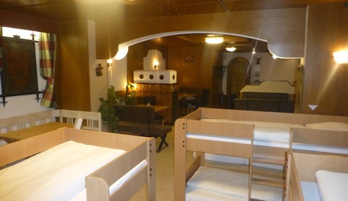 Dormitorio compartido junior, varias camas