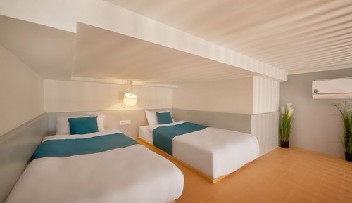 Habitación cuádruple Deluxe
