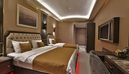 Habitación triple Deluxe