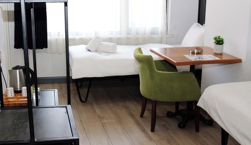 Habitación clásica con 2 camas individuales