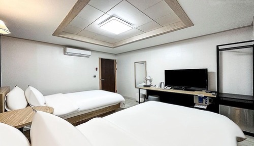 Habitación con 2 camas individuales