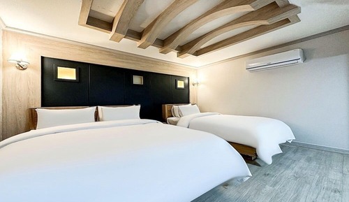 Habitación familiar con 2 camas individuales