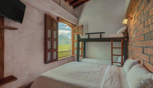 Habitación cuádruple Deluxe