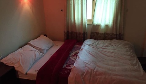 Habitación estándar con 1 cama doble o 2 individuales