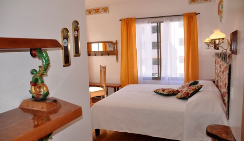 Habitación superior con 1 cama doble o 2 individuales