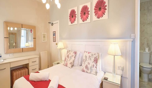 Habitación Signature con 1 cama doble o 2 individuales