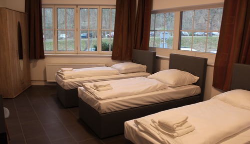 Habitación familiar, varias camas