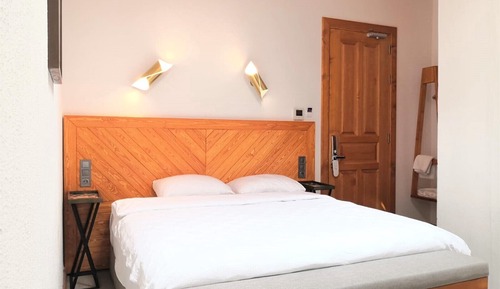 Habitación Signature con 1 cama doble o 2 individuales, no fumadores