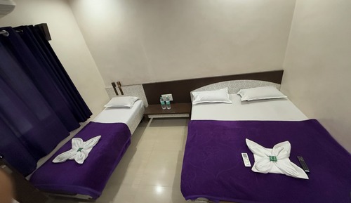 Habitación triple Deluxe