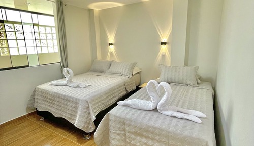 Habitación con 2 camas individuales