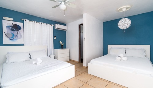 Habitación Signature, 2 camas de matrimonio, acceso a la piscina, vistas al jardín (Mar)