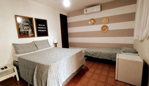 Habitación triple estándar, varias camas, vistas al jardín, en la zona del patio