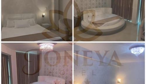 Habitación Confort doble, 2 camas de matrimonio, bañera de hidromasaje, vistas a la ciudad