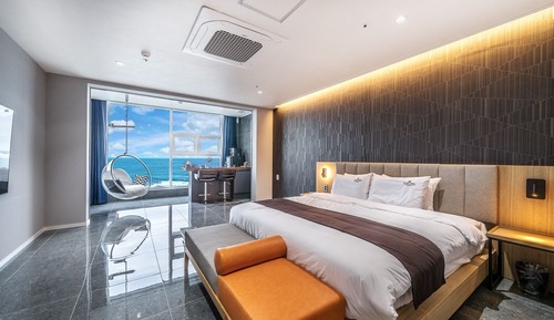 A. Deluxe Double Room