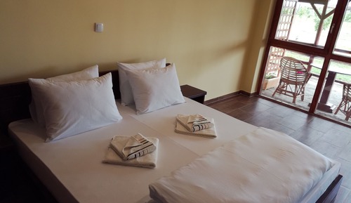 Habitación de lujo con 1 cama doble o 2 individuales, vistas al jardín