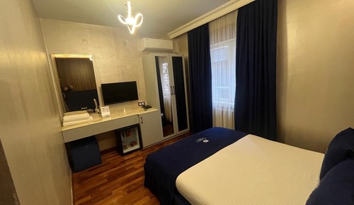 Habitación estándar con 1 cama doble o 2 individuales