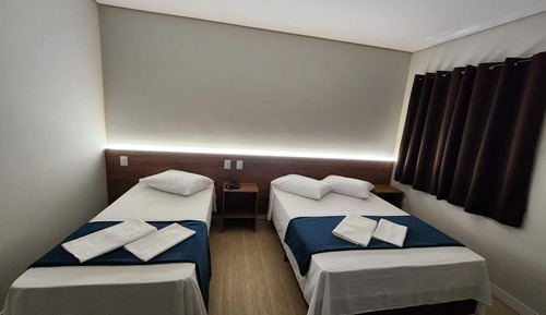 Habitación cuádruple Deluxe, varias camas