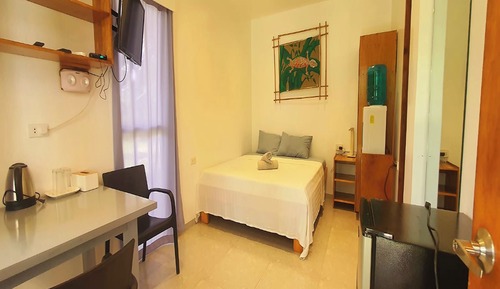 Habitación cuádruple estándar, 1 habitación, vistas al jardín, en la zona del jardín