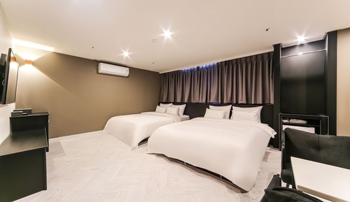 Habitación familiar con 2 camas individuales