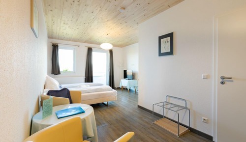 Habitación Confort con 1 cama doble o 2 individuales