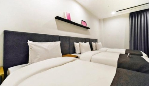 Habitación triple Deluxe, 3 camas individuales, planta baja