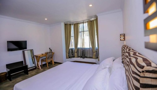Habitación cuádruple Deluxe