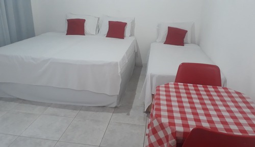 Habitación cuádruple, varias camas