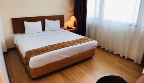 Habitación superior con 1 cama doble o 2 individuales, no fumadores