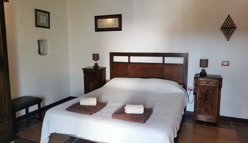 Habitación cuádruple, baño compartido, en la zona del jardín (Graziosa)