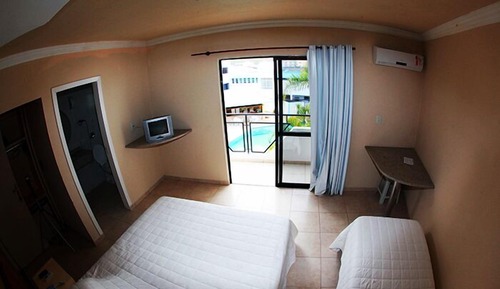 Habitación triple, varias camas