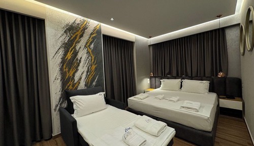 Habitación triple, balcón