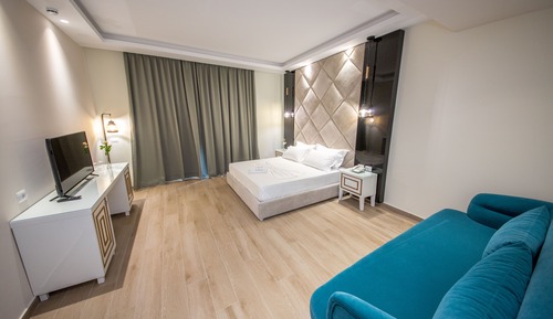 Habitación triple Deluxe, balcón, planta baja