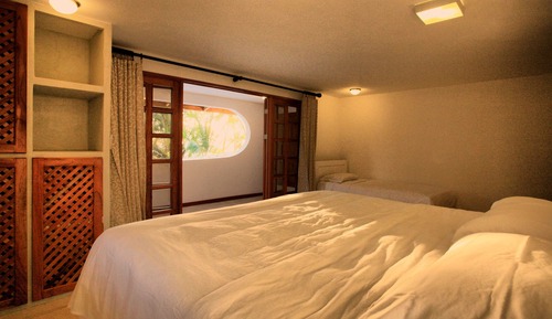 Habitación superior, junto a la playa