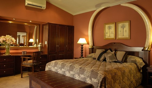 Suite ejecutiva, 1 cama de matrimonio grande, vistas al jardín