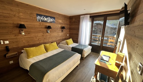 Habitación triple familiar, varias camas