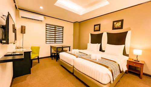 Habitación Deluxe con 1 cama doble o 2 individuales