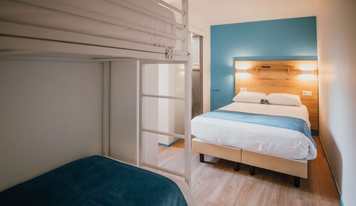 Habitación familiar, varias camas